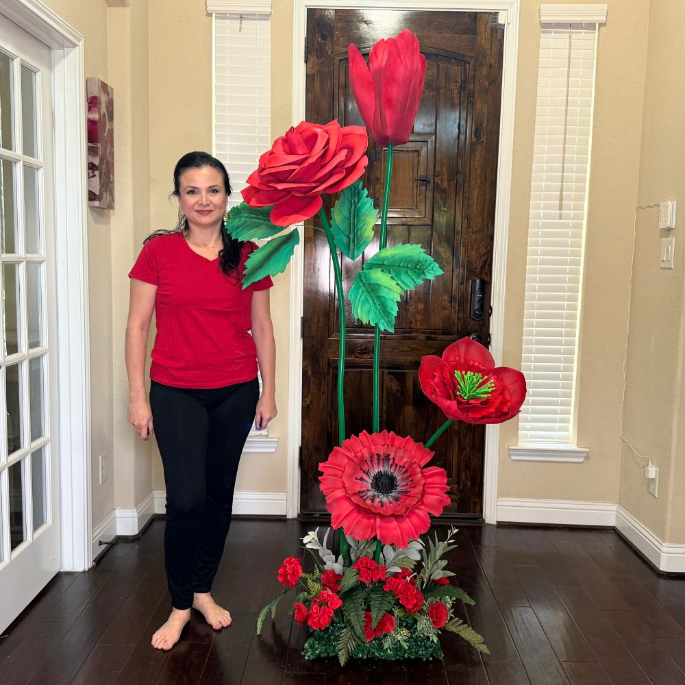 All-red giant foam flower arrangement featuring oversized roses and mixed red blooms for event staging