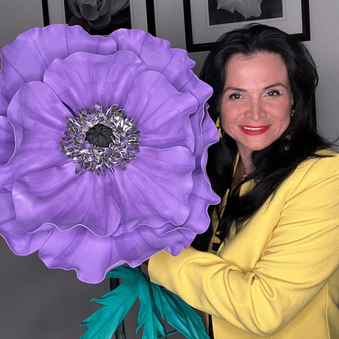 Giant purple anemone foam flower on black background with dark center and delicate petal detail from DIY kit