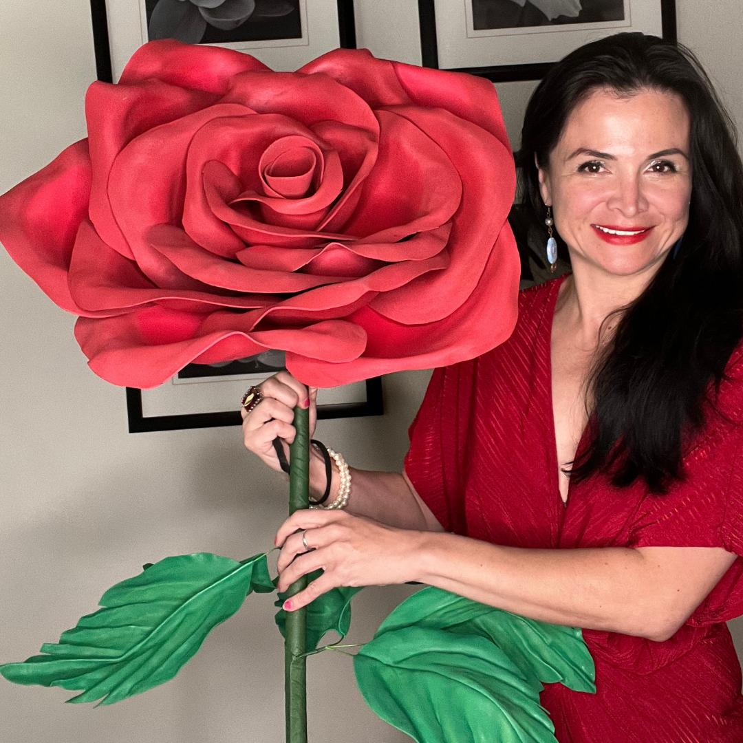 Completed giant red rose foam flower from DIY kit showing classic rose shape with layered crimson petals