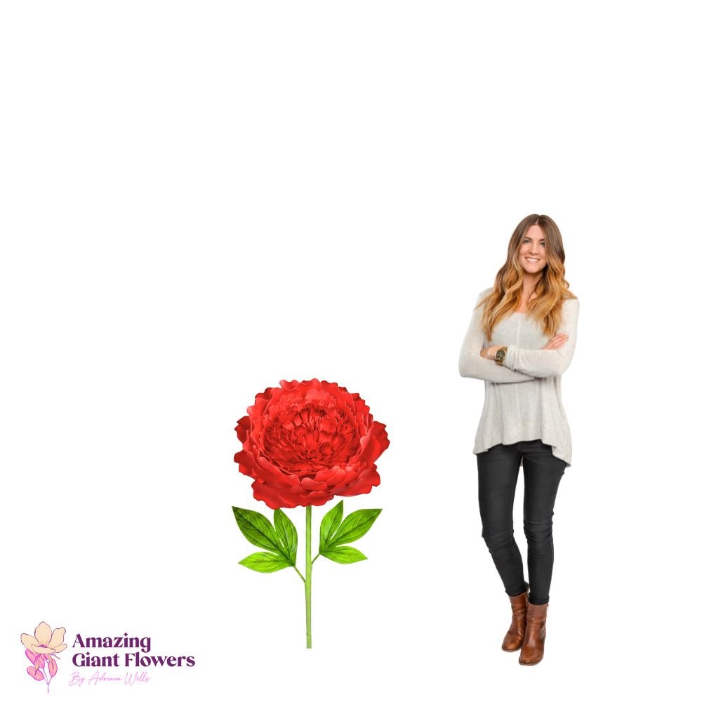 Woman holding completed giant pink peony foam flower from pre-cut DIY craft kit showing full bloom