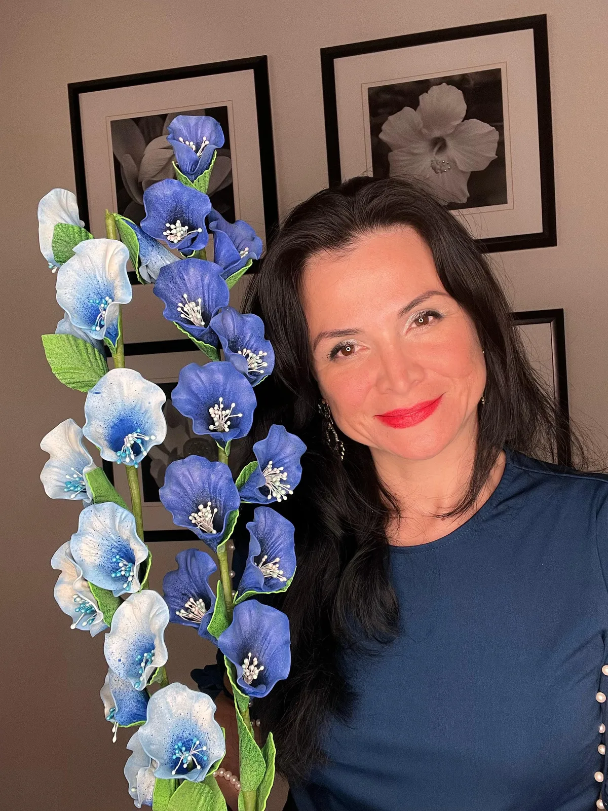 Blue real touch gladiolus foam flowers held by Adriana Wells — tall 24-inch DIY EVA foam gladiola stems with ruffled florets