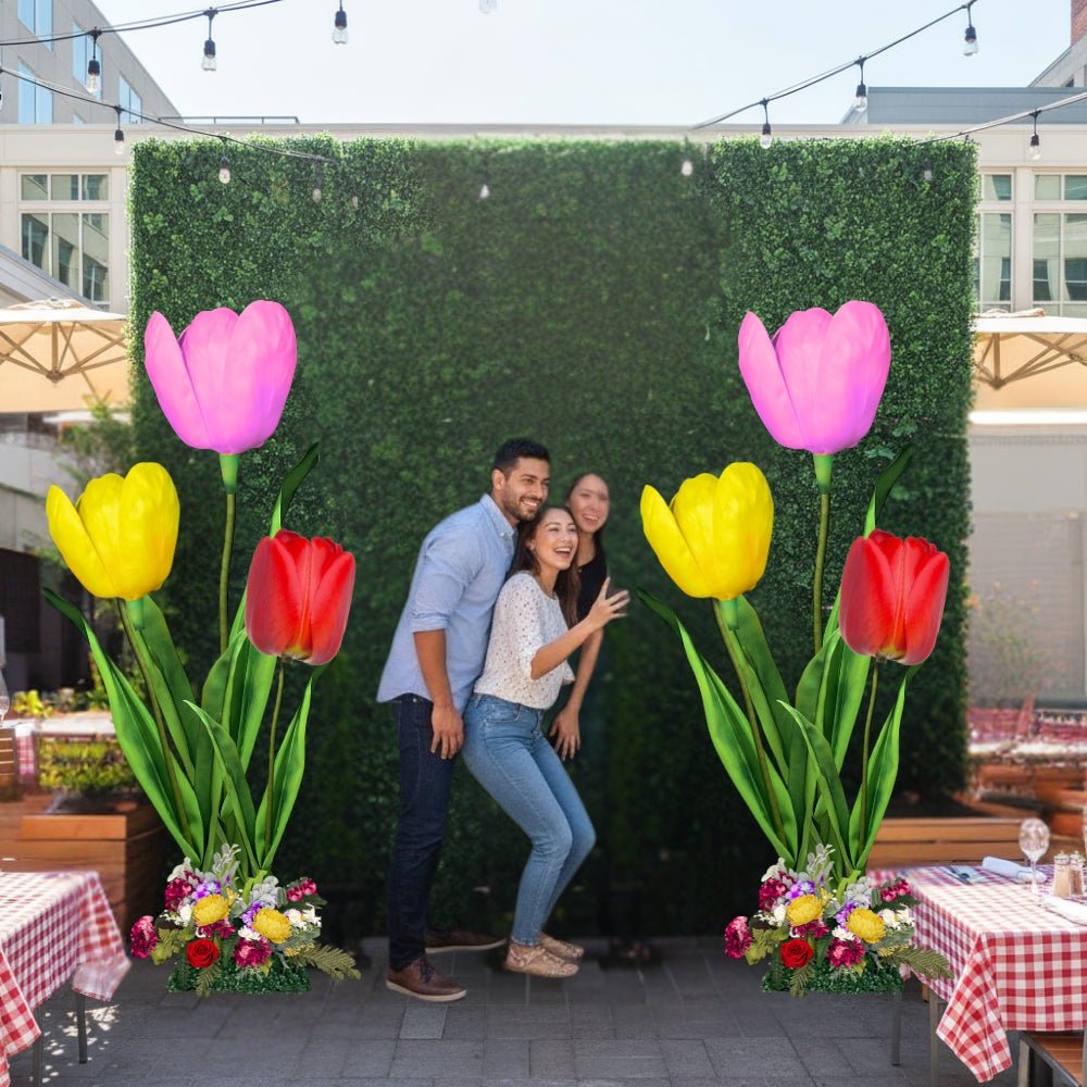 Wide view of photo booth wall flower display showing full step and repeat pattern for event photography