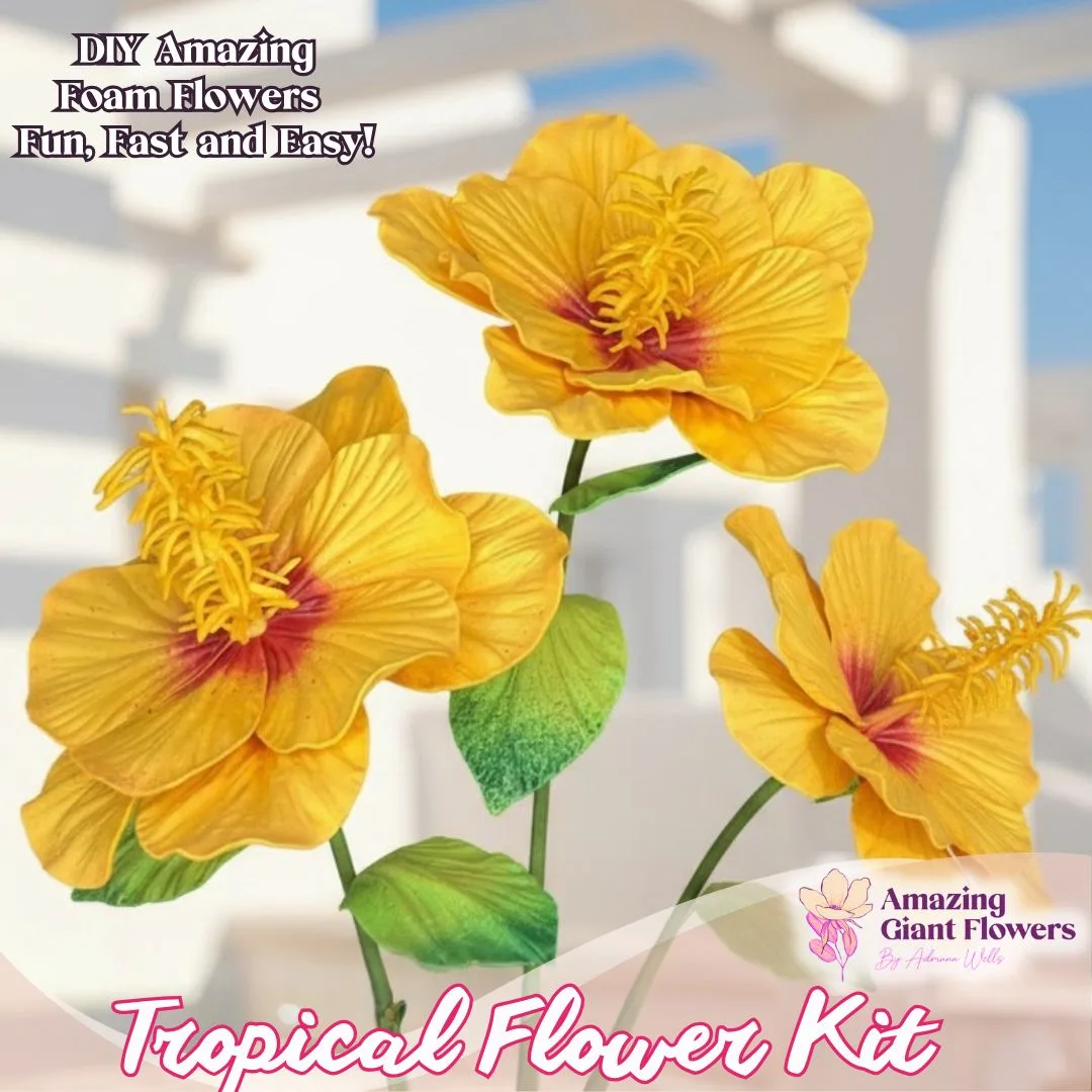 Real touch yellow tropical flower foam kit — golden DIY hibiscus spray with ruffled petals and golden stamen center in the Amazing Giant Flowers kit box