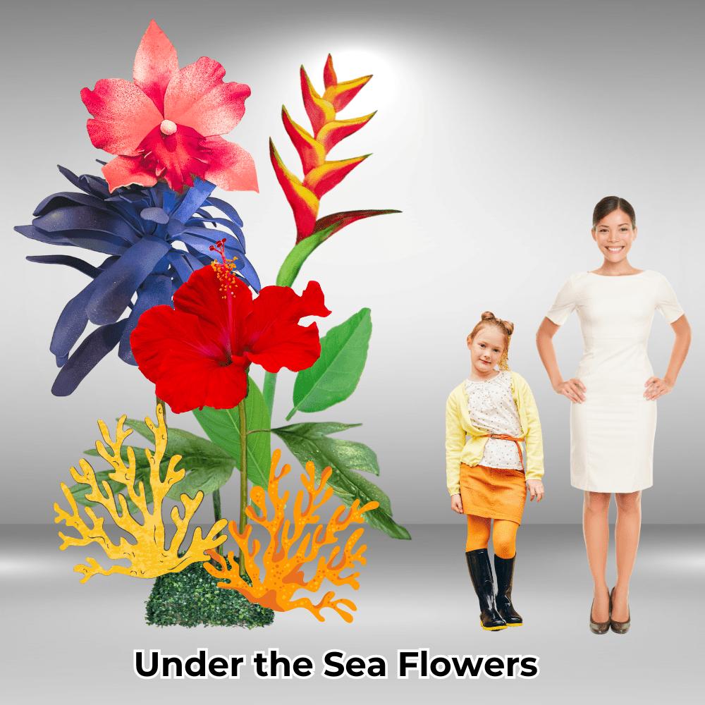 Under the sea themed giant foam flowers in ocean blues, teals, and corals for aquatic-themed event decor