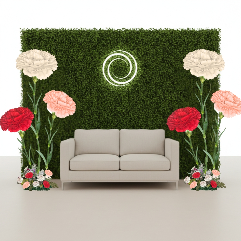 Close-up of photo booth backdrop flowers highlighting pink roses and white accents for event staging